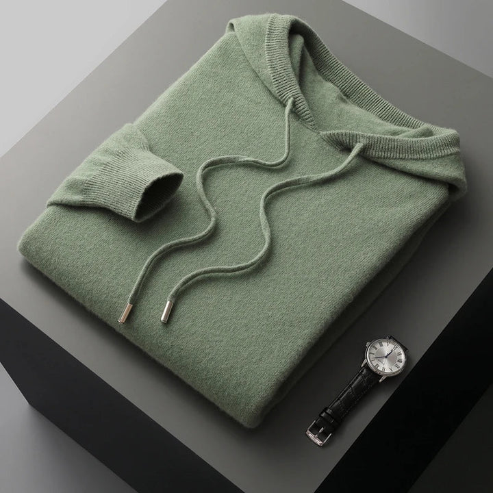 "Men's luxury cashmere hoodie with adjustable hood, slim fit, ribbed cuffs, in versatile colors, soft and breathable."