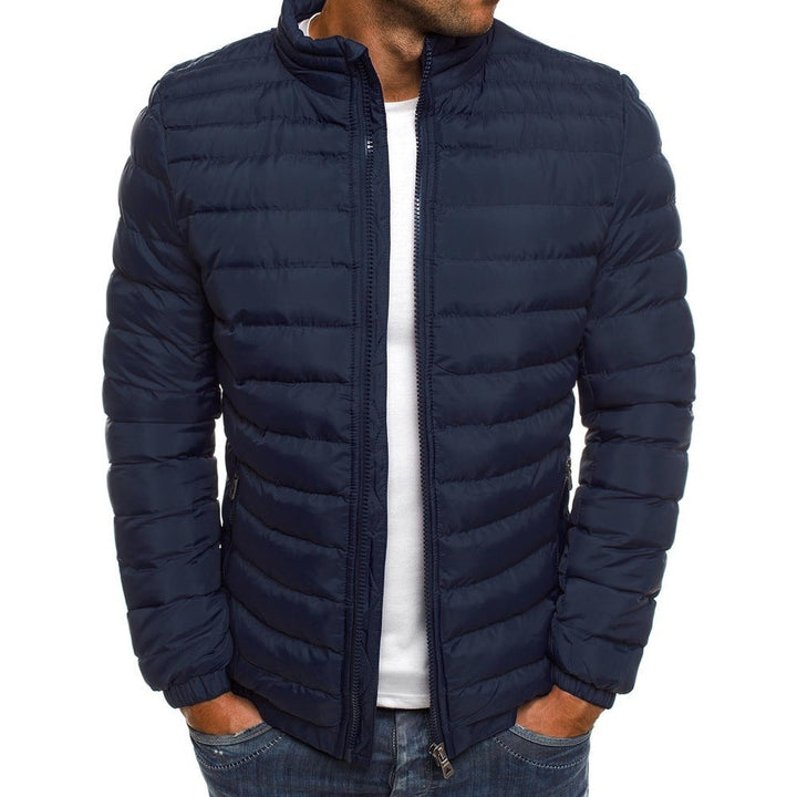 Men's luxury down puffer jacket, navy with stand collar, offering stylish warmth and tailored fit for winter fashion.