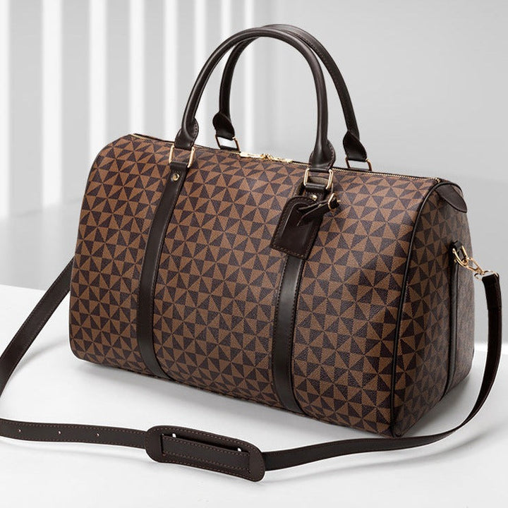 Men's premium travel bag; stylish, durable handbag with sleek design; ample compartments for travel essentials; sophisticated
