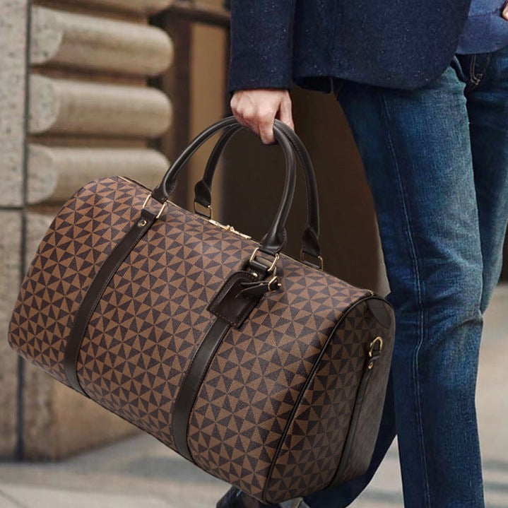 Men's premium travel bag; stylish, durable handbag with sleek design; ample compartments for travel essentials; sophisticated