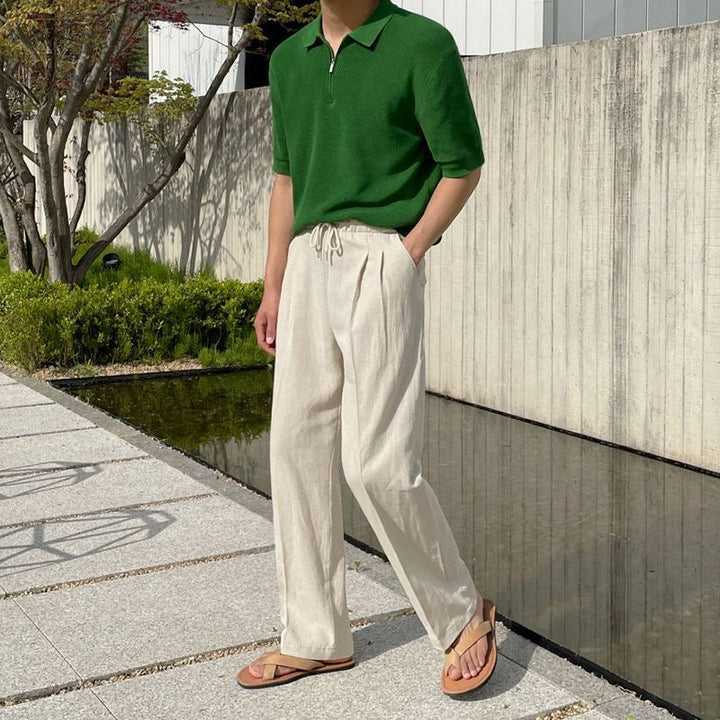 "Men's relaxed fit linen pants in beige, front view, lightweight fabric, perfect for casual and refined occasions."