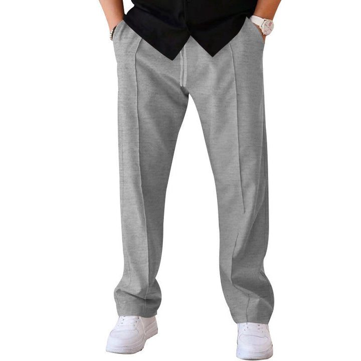 "Men's relaxed linen trousers, wide-leg, breathable, versatile colors like beige, black, blue; perfect comfort and style"