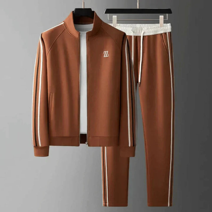 "Men's relaxed tracksuit set, cotton-polyester blend, gray hue, pullover top, elastic waist, perfect for lounging or activiti