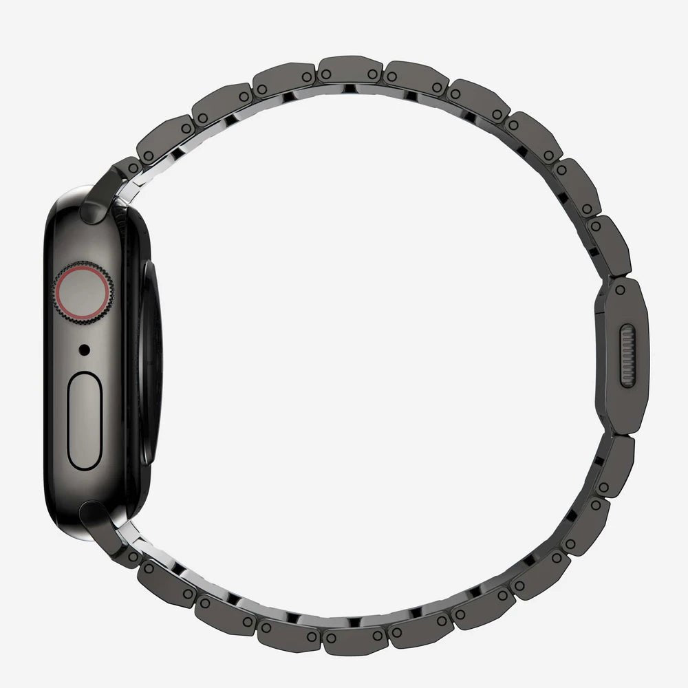 Men's sleek titanium watch band with shiny finish, magnetic clasp, durable and lightweight; perfect for daily or formal wear.