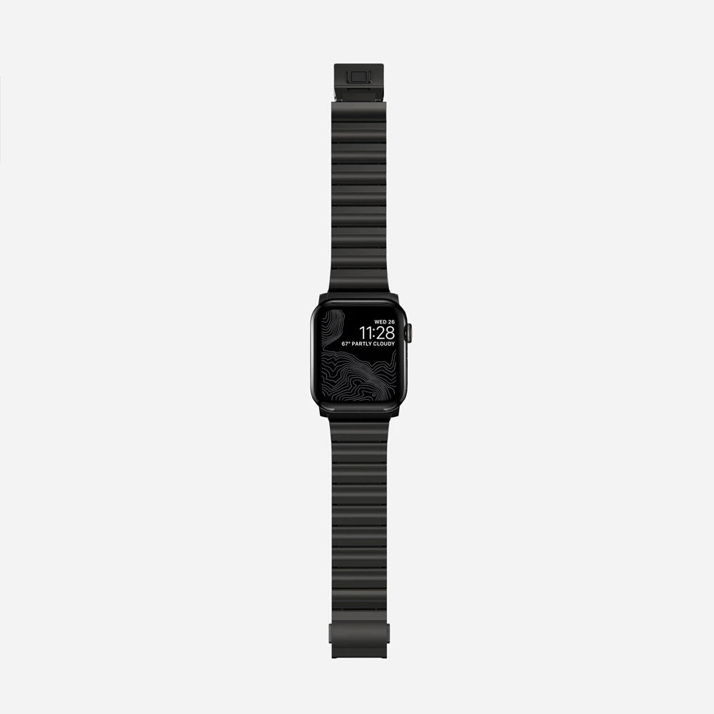 Men's sleek titanium watch band with shiny finish, magnetic clasp, durable and lightweight; perfect for daily or formal wear.