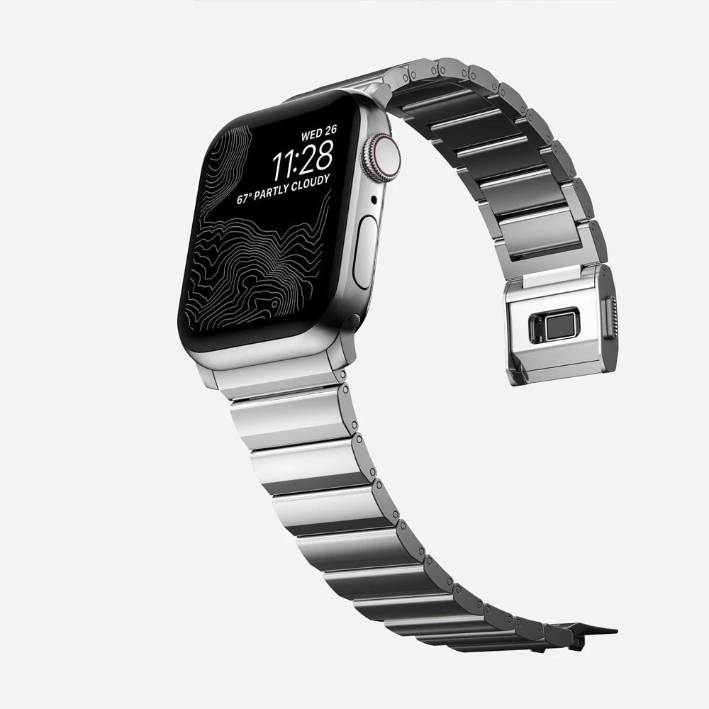 Men's sleek titanium watch band with shiny finish, magnetic clasp, durable and lightweight; perfect for daily or formal wear.