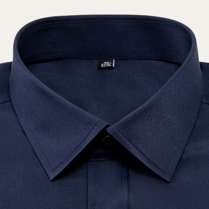 "Men's slim fit business shirt; elegant cotton fabric, sleek silhouette; ideal for office wear and special occasions."