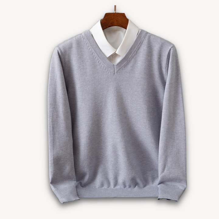 "Men's slim fit cashmere V-neck sweater in black, showcasing soft fabric and versatile design for casual or formal wear."