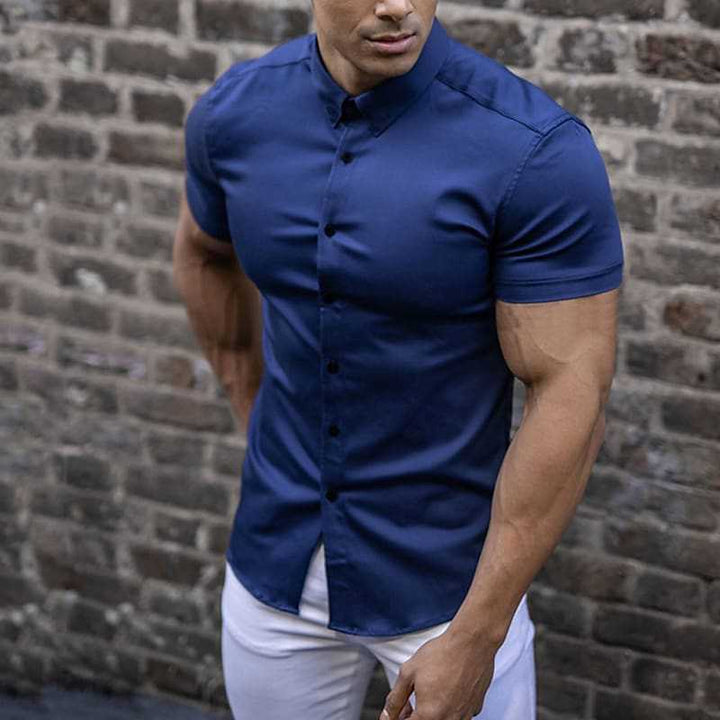 "Men's slim fit short sleeve shirt in a sleek design, front view showcasing tailored elegance and breathable fabric."