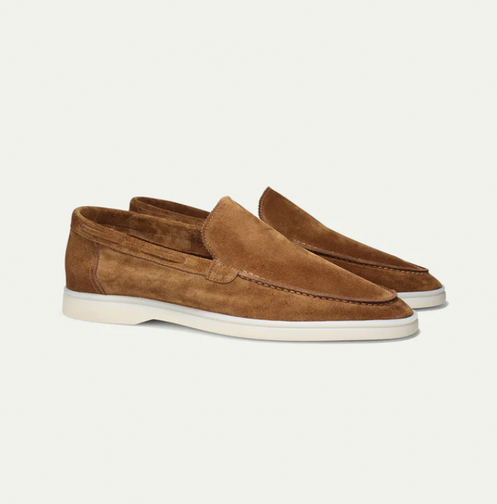 "Men's suede loafers in dark brown, elegant and comfortable, perfect for casual or formal wear, crafted from luxury suede."