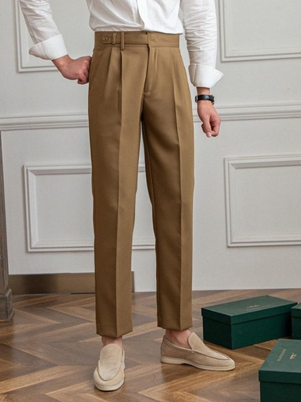 Men’s tailored essential trousers in classic colors, streamlined fit, perfect for formal or casual wear, showcasing elegance.