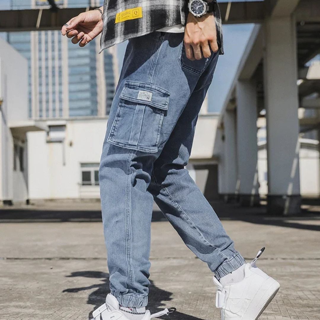 Men's Utility Denim Joggers with Pockets, soft denim, elastic waistband, multiple pockets, versatile casual streetwear pants.