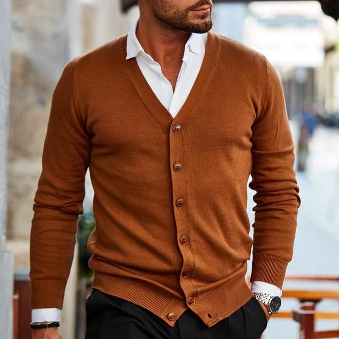 Men's versatile cardigan in soft gray, showcasing a classic design and relaxed fit for casual comfort and style adaptability.