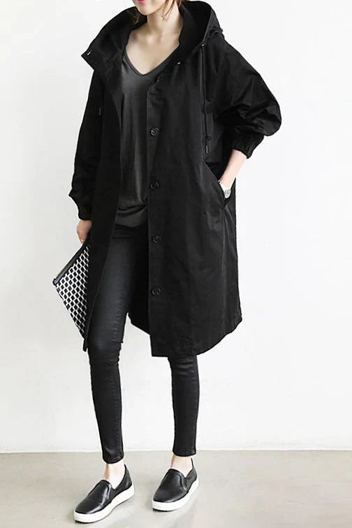 "Men's waterproof trench coat with hood, long tailored fit in black, showcasing stylish design and weather-resistant fabric."