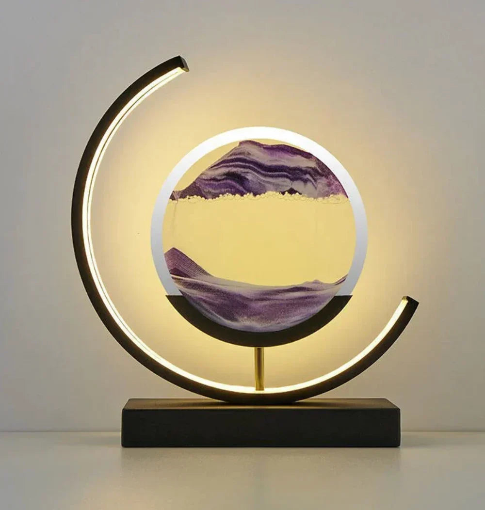 Close-up of the flowing sand in Serenova moving art lamp, displaying dynamic, tranquil landscape patterns.