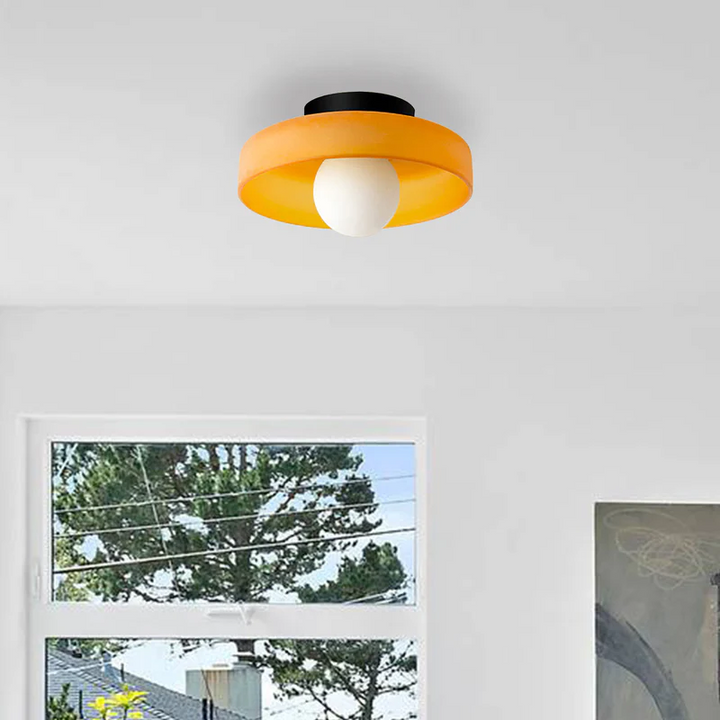 "Minimal flush mount ceiling light with frosted shade, sleek finish, offers soft illumination; ideal for modern and tradition