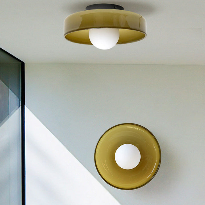 "Minimal flush mount ceiling light with frosted shade, sleek finish, offers soft illumination; ideal for modern and tradition