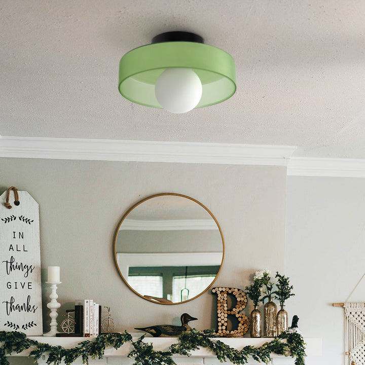 "Minimal flush mount ceiling light with frosted shade, sleek finish, offers soft illumination; ideal for modern and tradition