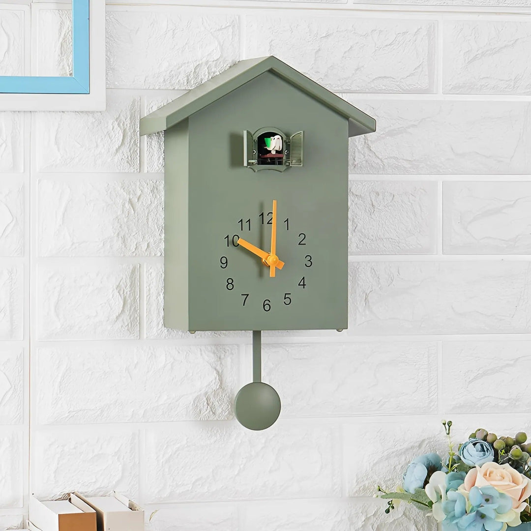 "Minimalist cuckoo wall clock with sleek black and white finish, modern design, whimsical bird element, compact 20x25cm size.