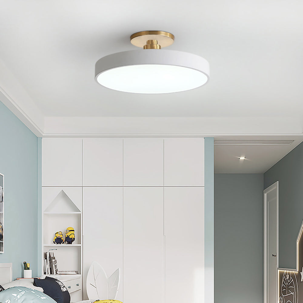 "Minimalist LED ceiling light, semi-flush design, brightens spaces with elegant style and energy-efficient glow."