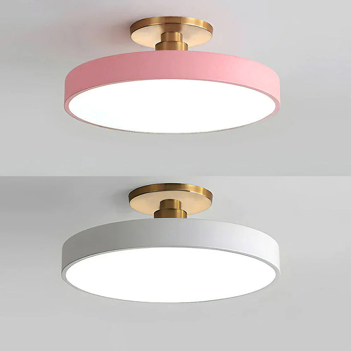 "Minimalist LED ceiling light, semi-flush design, brightens spaces with elegant style and energy-efficient glow."
