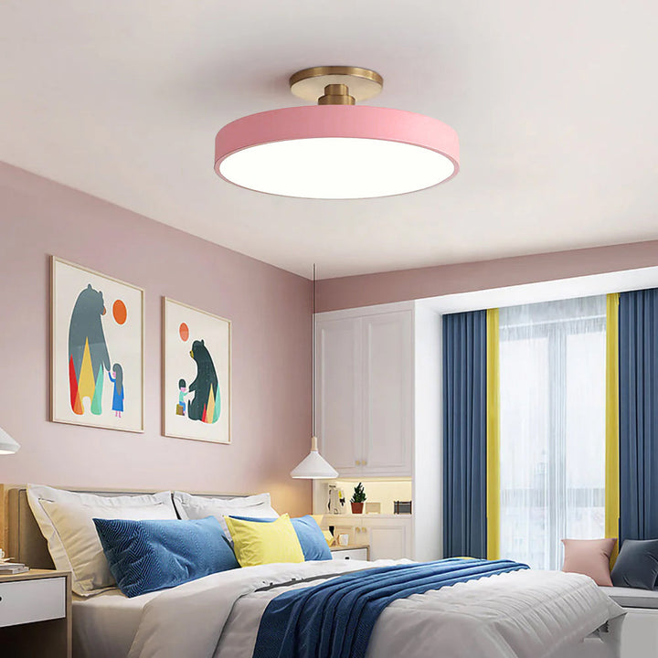 "Minimalist LED ceiling light, semi-flush design, brightens spaces with elegant style and energy-efficient glow."