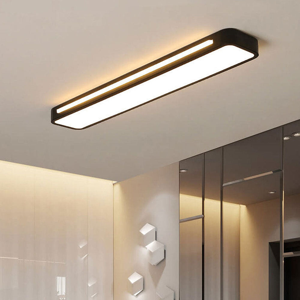"Minimalist Nordic long LED ceiling light with sleek black finish and modern design for elegant interior lighting"