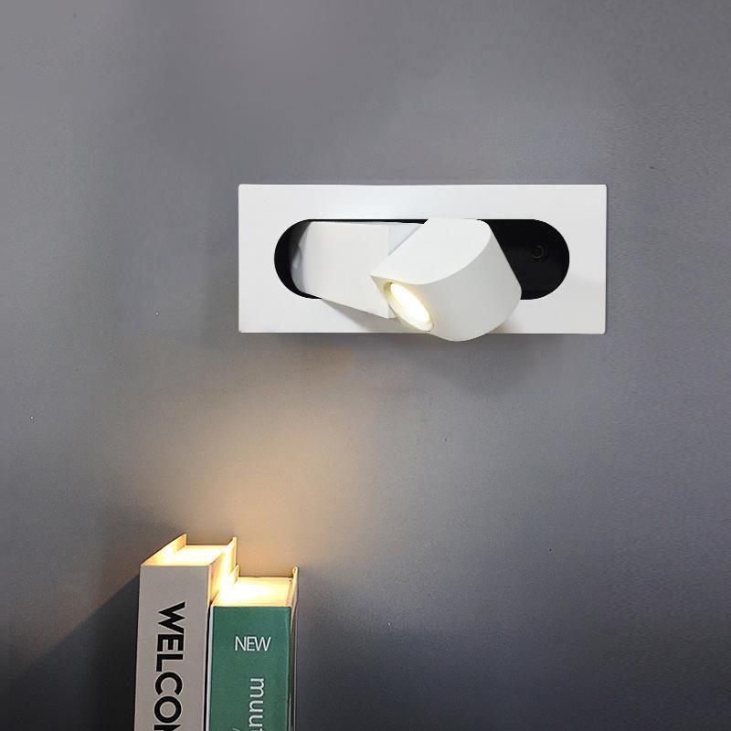 Modern adjustable LED bedside lamp in matte black with a sleek design, featuring an adjustable head for focused reading light
