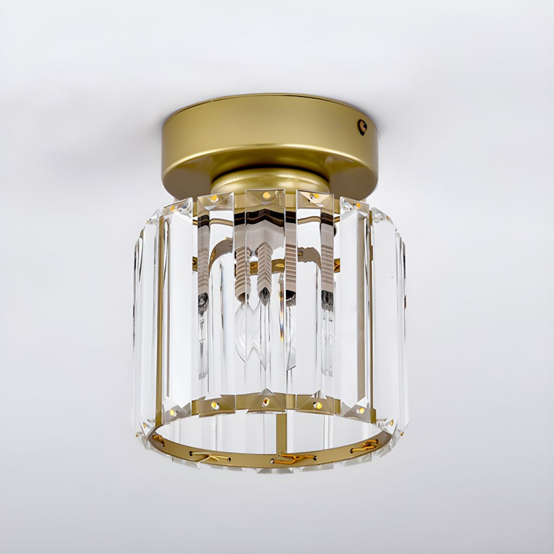 Modern black crystal flush mount ceiling light, sleek brass fixture, crystal shade, ideal for rooms with low ceilings.