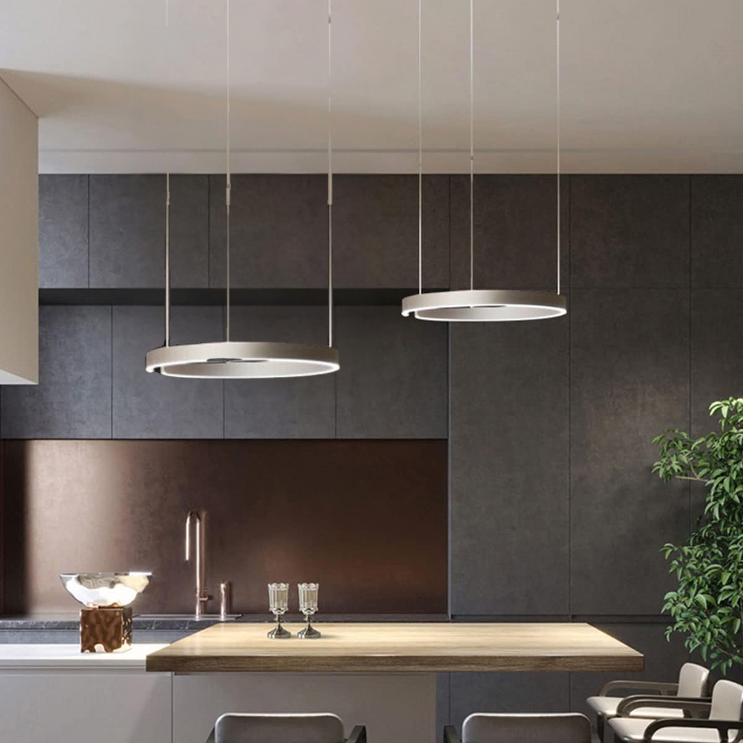 "Modern circular LED pendant light in minimal design, black finish, ideal for elegant home interiors and efficient lighting."