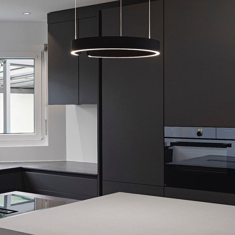 "Modern circular LED pendant light in minimal design, black finish, ideal for elegant home interiors and efficient lighting."