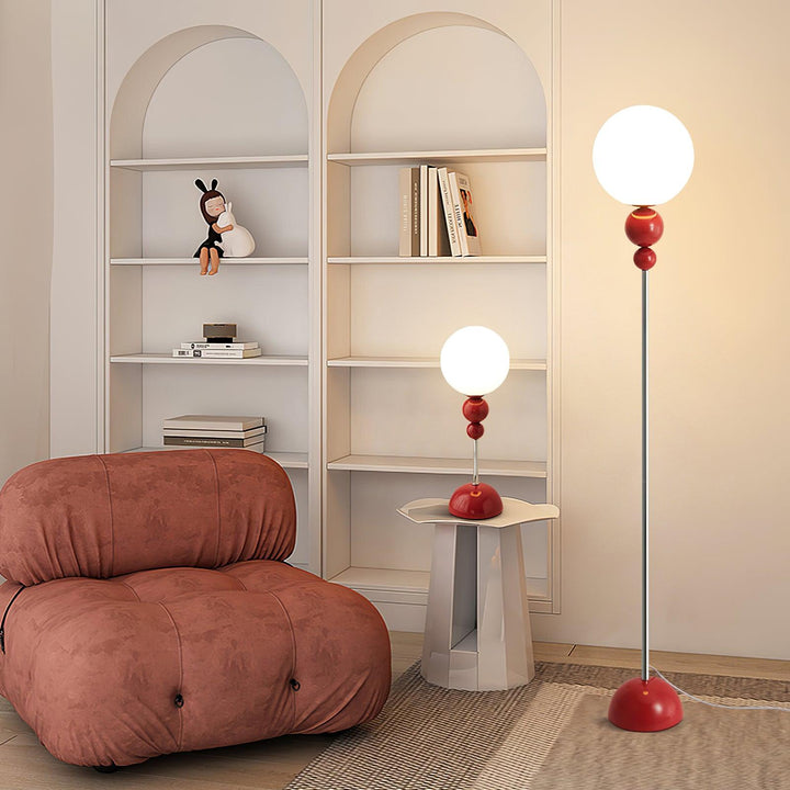 Modern Clavel metal floor lamp with glass accent, 59-inch height, sleek modern design, adds elegance to any room decor.