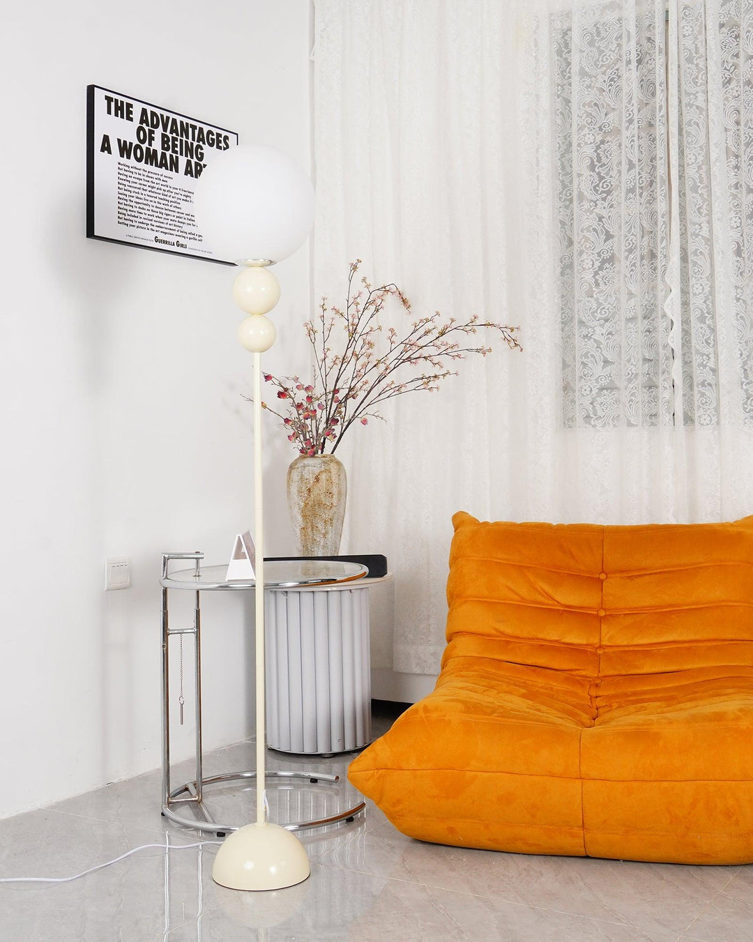 Modern Clavel metal floor lamp with glass accent, 59-inch height, sleek modern design, adds elegance to any room decor.