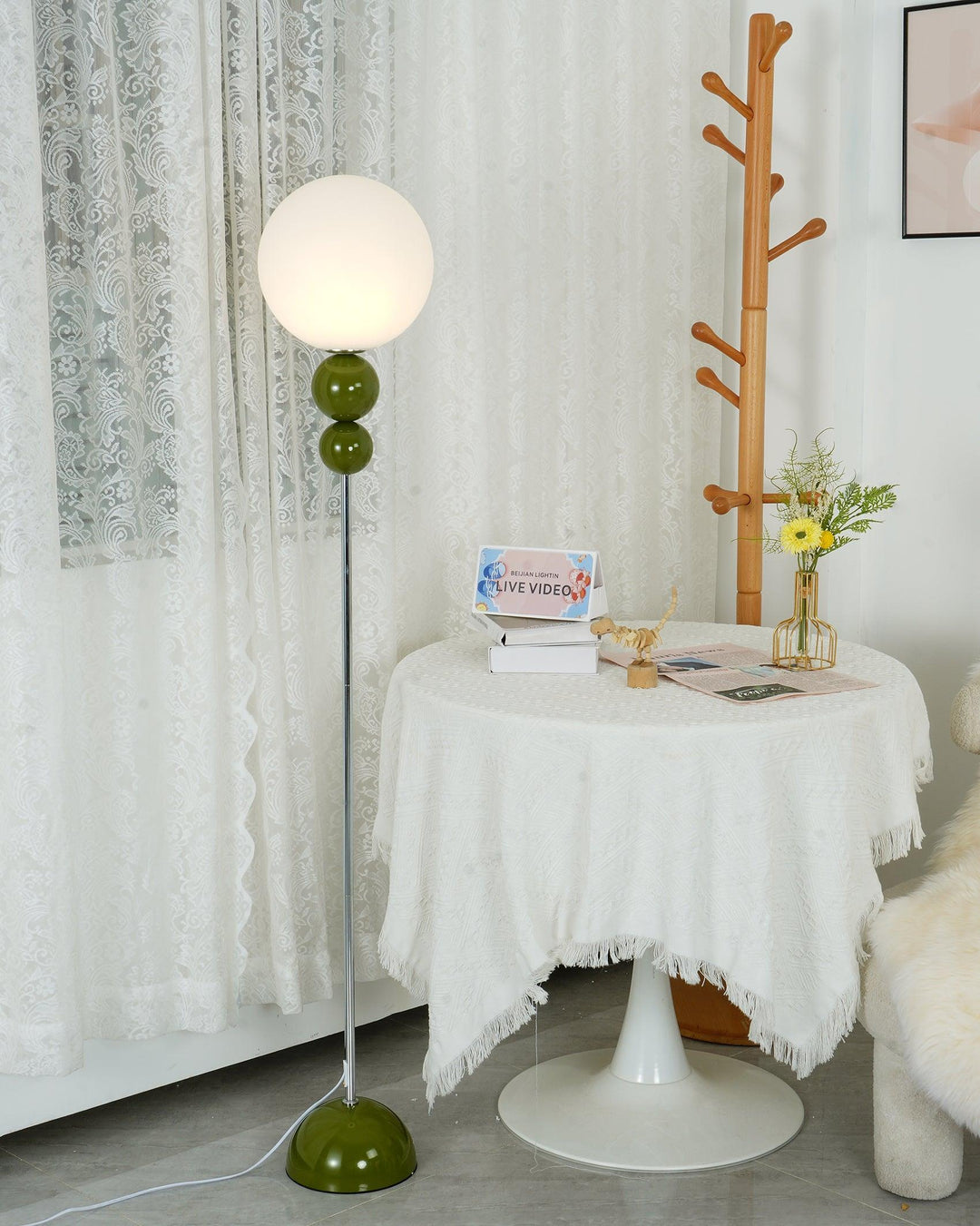 Modern Clavel metal floor lamp with glass accent, 59-inch height, sleek modern design, adds elegance to any room decor.