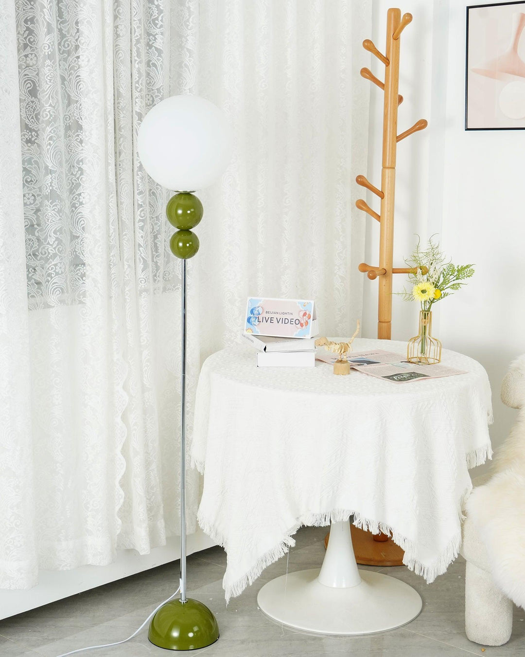 Modern Clavel metal floor lamp with glass accent, 59-inch height, sleek modern design, adds elegance to any room decor.