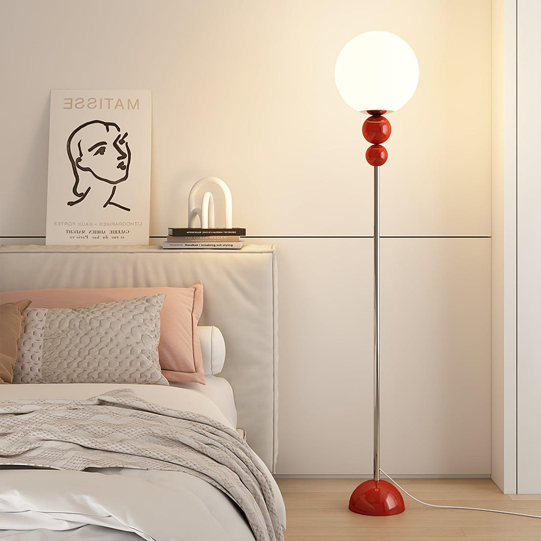 Modern Clavel metal floor lamp with glass accent, 59-inch height, sleek modern design, adds elegance to any room decor.
