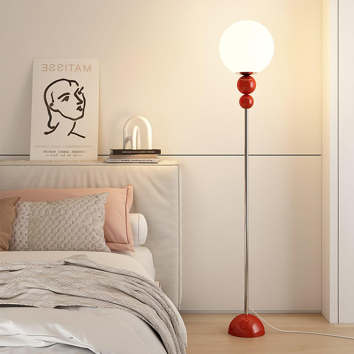 Modern Clavel metal floor lamp with glass accent, 59-inch height, sleek modern design, adds elegance to any room decor.