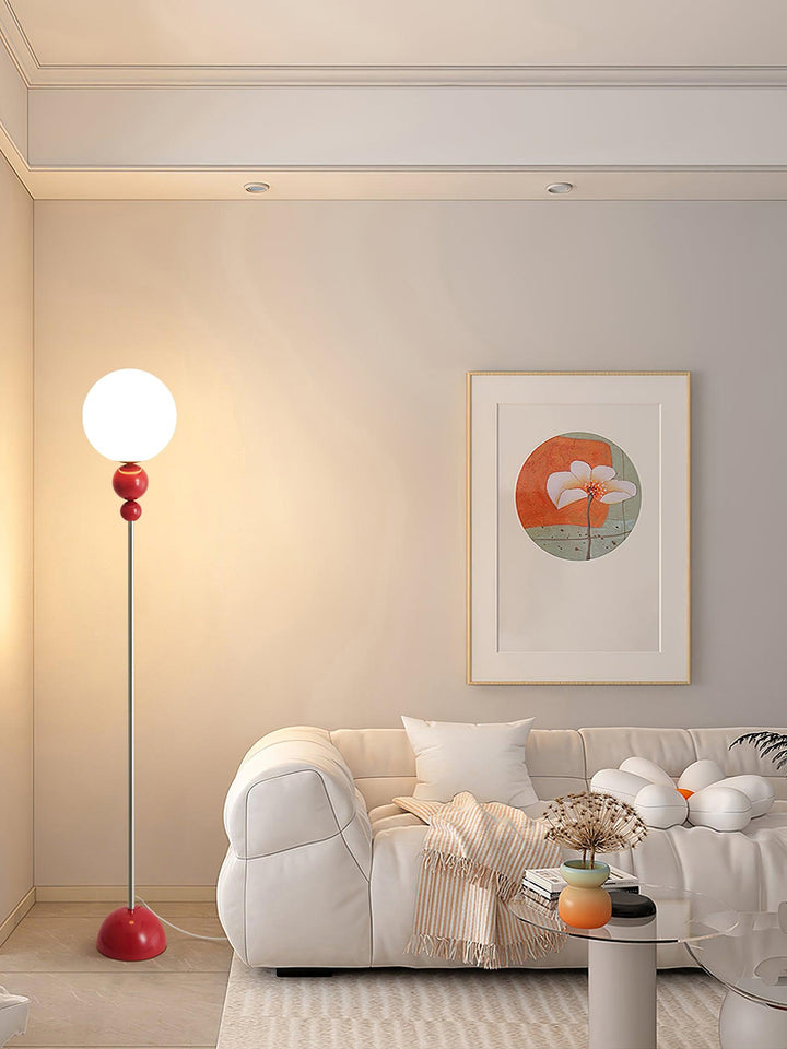 Modern Clavel metal floor lamp with glass accent, 59-inch height, sleek modern design, adds elegance to any room decor.
