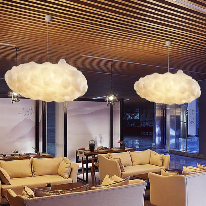 "Modern cloud-inspired pendant light with a soft ambient glow, featuring a dreamy design for elegant home decor spaces."