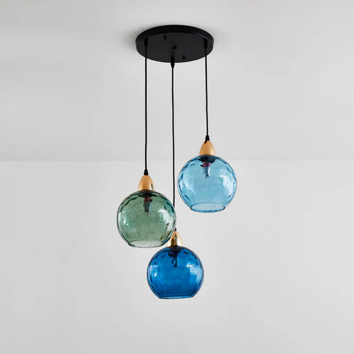 Sleek 3-lamp cluster pendant light, a modern ceiling fixture for any room.