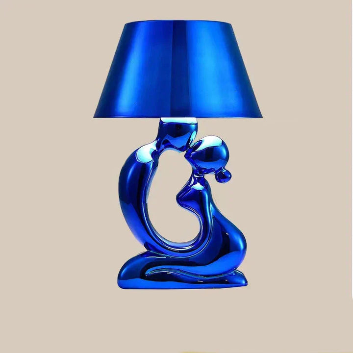 Stylish modern designer table lamp. Creates elegant ambient light, perfect for contemporary home and office decor.