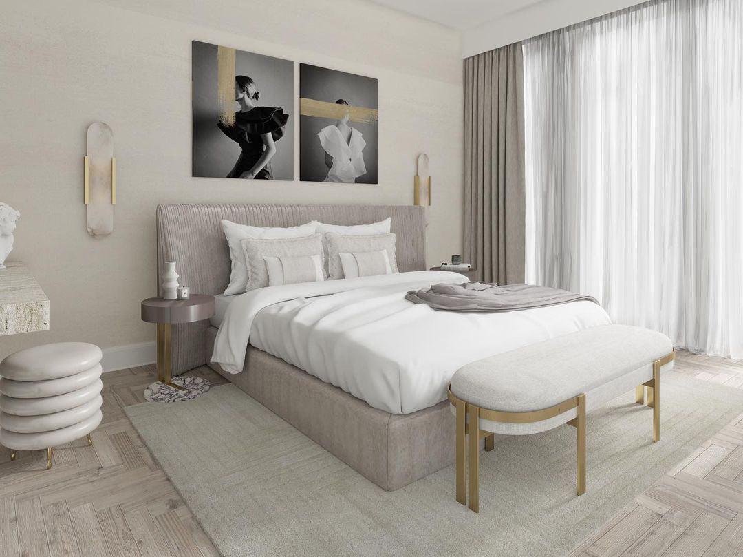 "Modern elongated alabaster wall lamp with metal and brass accents, emits warm glow, suitable for chic interior decor."