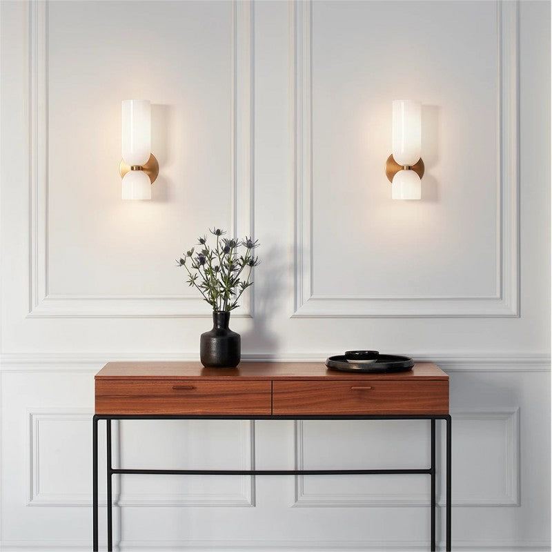"Modern glass twin wall light with dual glass shades, ideal for stylish interiors, adding elegance and versatile illumination