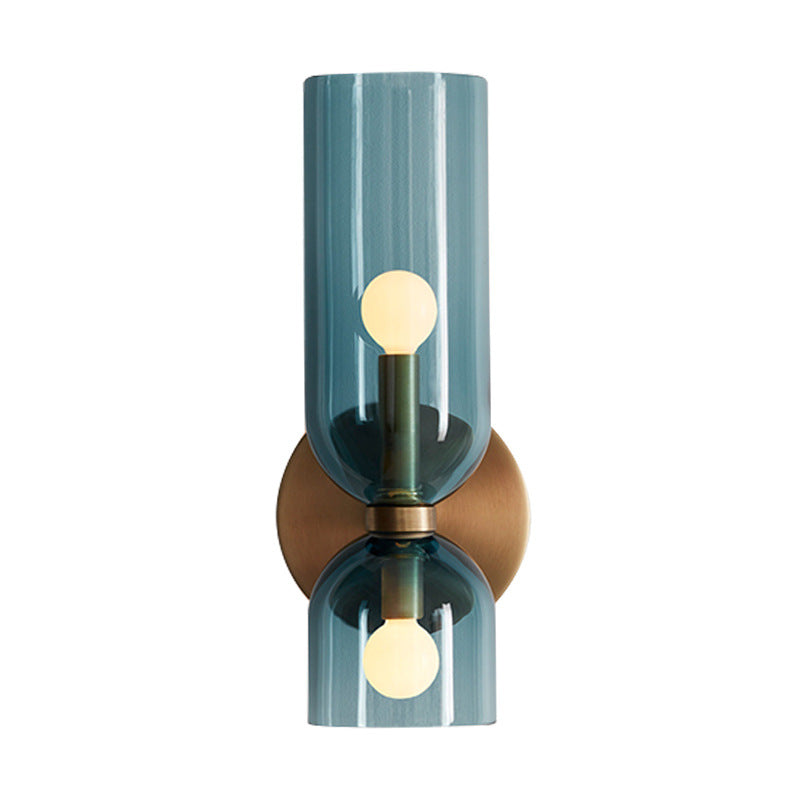 "Modern glass twin wall light with dual glass shades, ideal for stylish interiors, adding elegance and versatile illumination