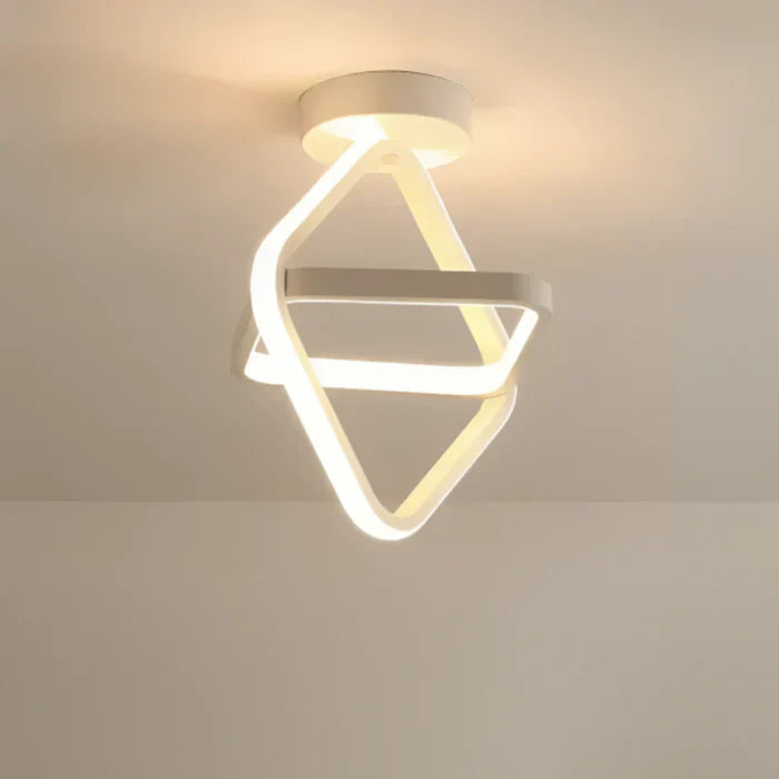 Sleek dual-ring LED ceiling lamp. Modern lighting solution adds elegance to any contemporary space.