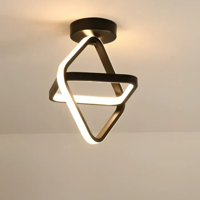 Modern LED light with unique double ring design. A stylish and bright addition to your home's interior.