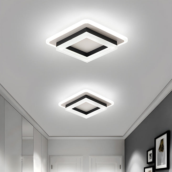 "Modern LED ceiling light with sleek square design, black finish, ideal for stylish hallways, emits bright 1920 lumens."