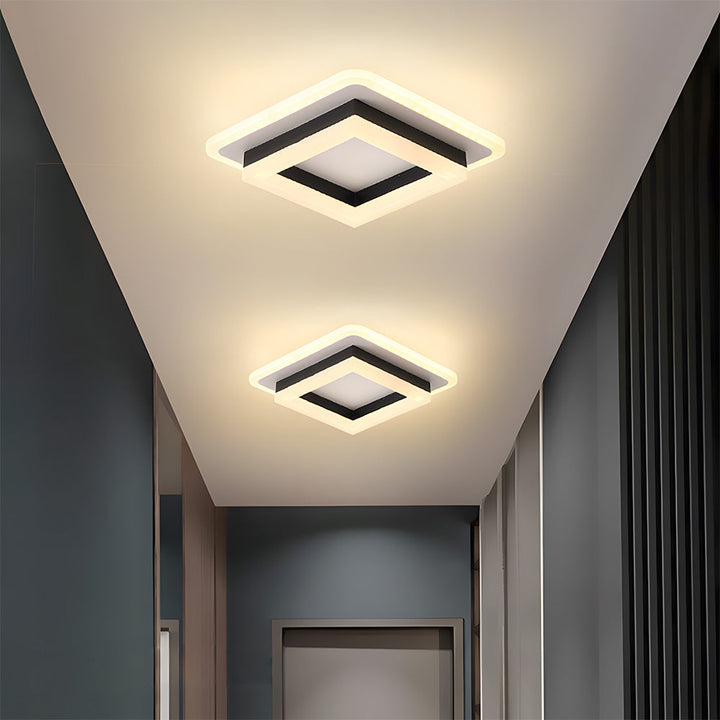 "Modern LED ceiling light with sleek square design, black finish, ideal for stylish hallways, emits bright 1920 lumens."