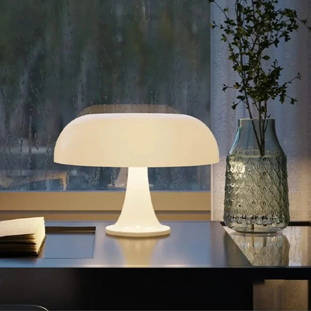 "Modern LED table lamp with USB charging, dimmable light, sleek ABS design, ideal for bedrooms or living rooms."