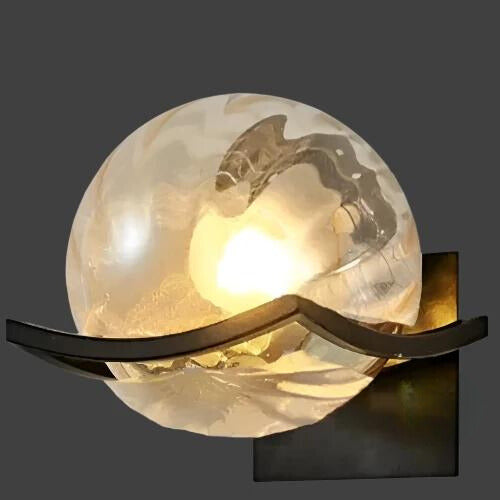 A modern LED wall lamp providing ambient lighting in a living space.